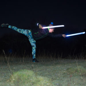 Warrior III Pose in December 3rd 2017.  Seltering with dual improvised lightsabers